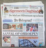 Beeldvergroting: Openingskoppen van AD en De Telegraaf, vandaag